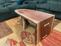 a coffee table made from a tree stump